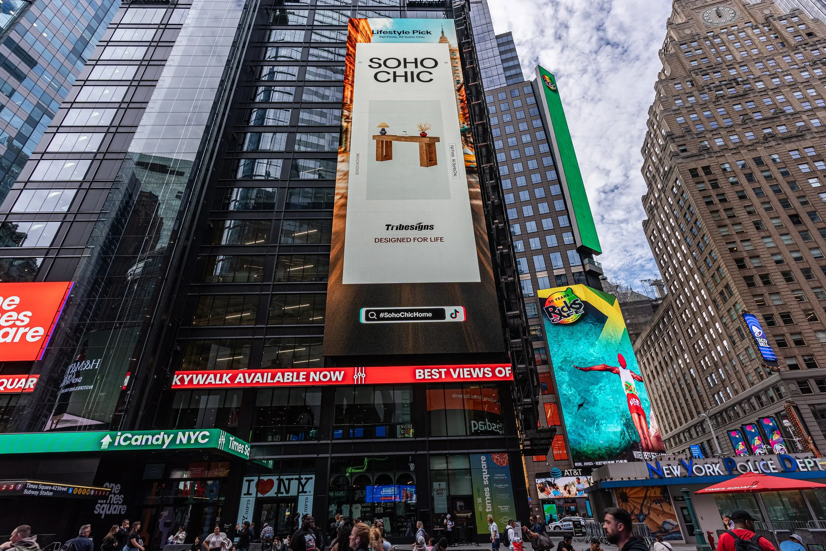 Times Square billboards advertising Soho Chic Home, iCandy NYC and Ricks sports drinks